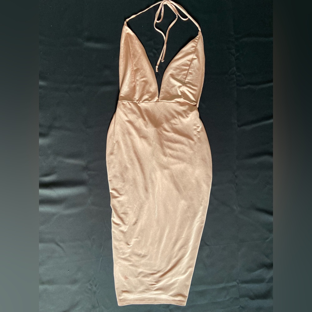 Pink silk dress with open back.